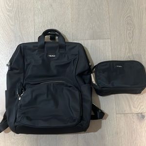 Tumi Black nylon with silver hardware backpack and pouch Perfect Diaper bag